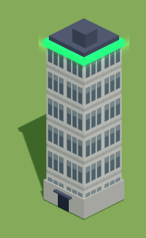A glass-fronted office block with a lit band at the roofline.